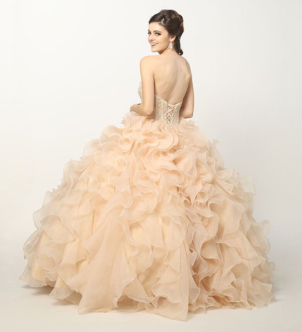 Champagne strapless ball gown with beaded corset bodice and layered organza ruffle skirt, side