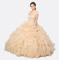Champagne strapless ball gown with beaded corset bodice and layered organza ruffle skirt, front