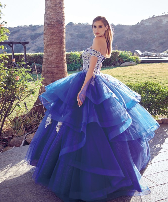 Off-shoulder blue tulle ball gown with metallic embroidery and voluminous tiered skirt
