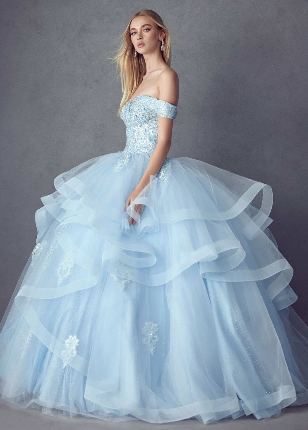 Light blue off-shoulder ball gown with full tiered tulle skirt and sparkly lace appliques