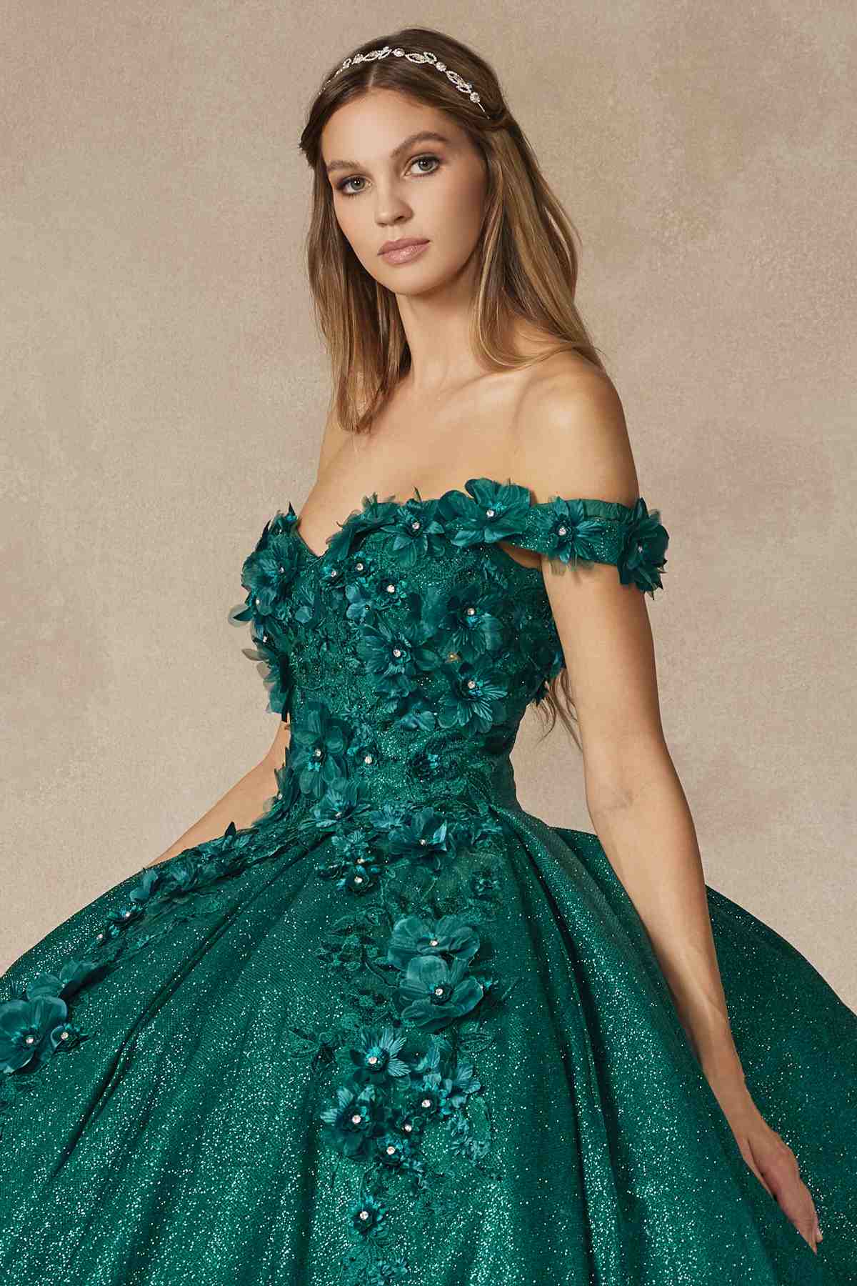 Green off-shoulder ball gown bodice with floral appliques, glitter texture, and full skirt