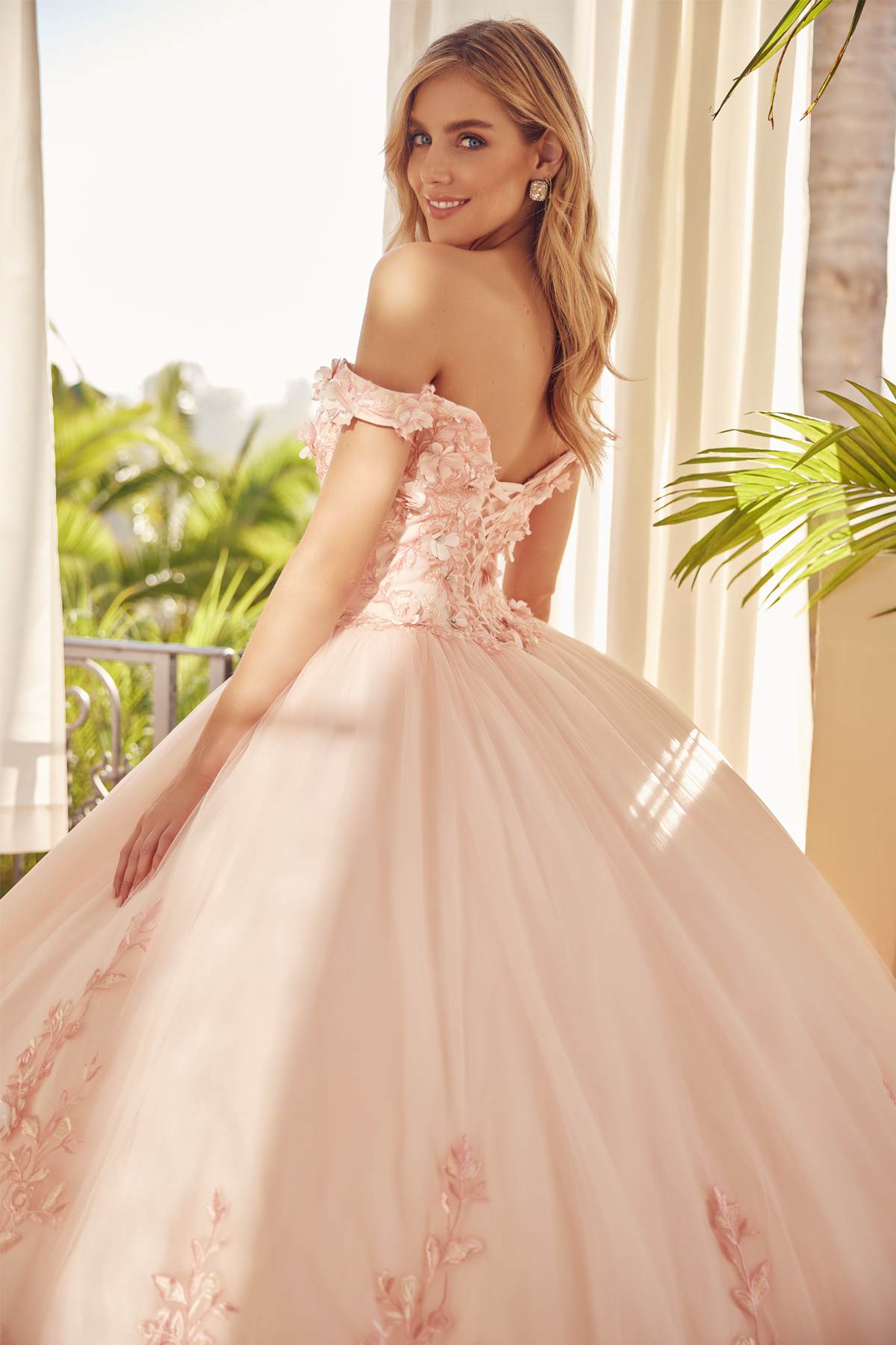 Blush off-shoulder ball gown with embroidered lace bodice and textured floral skirt