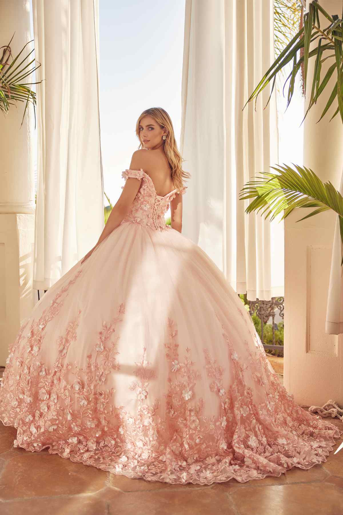 Blush off-shoulder ball gown with lace bodice, floral embroidery, full tulle skirt