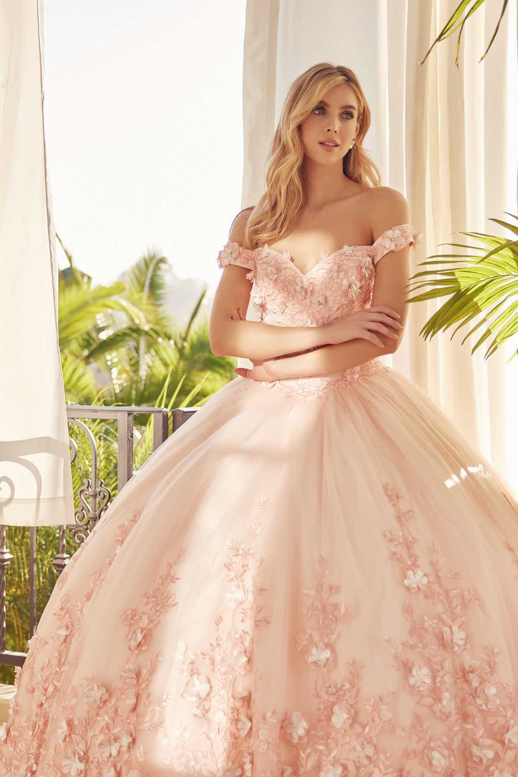 Blush off-shoulder gown with fitted lace corset, embroidered florals, and full skirt