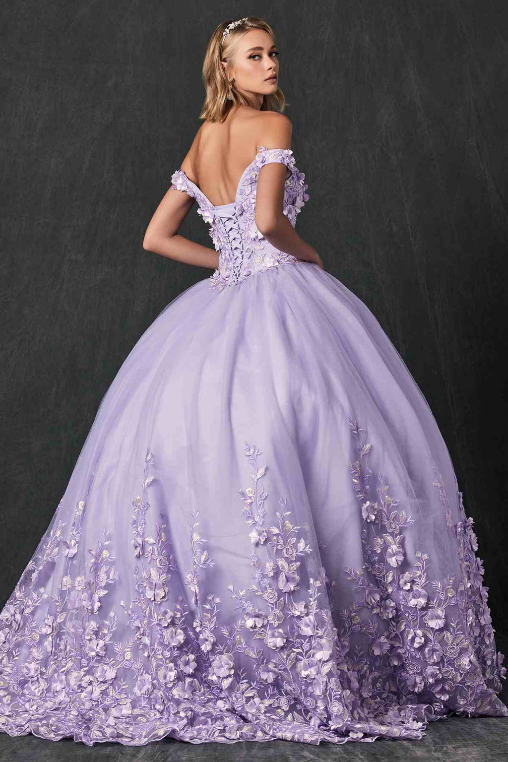 Lilac quinceanera ball gown side view with off-shoulder straps and embroidered floral tulle skirt
