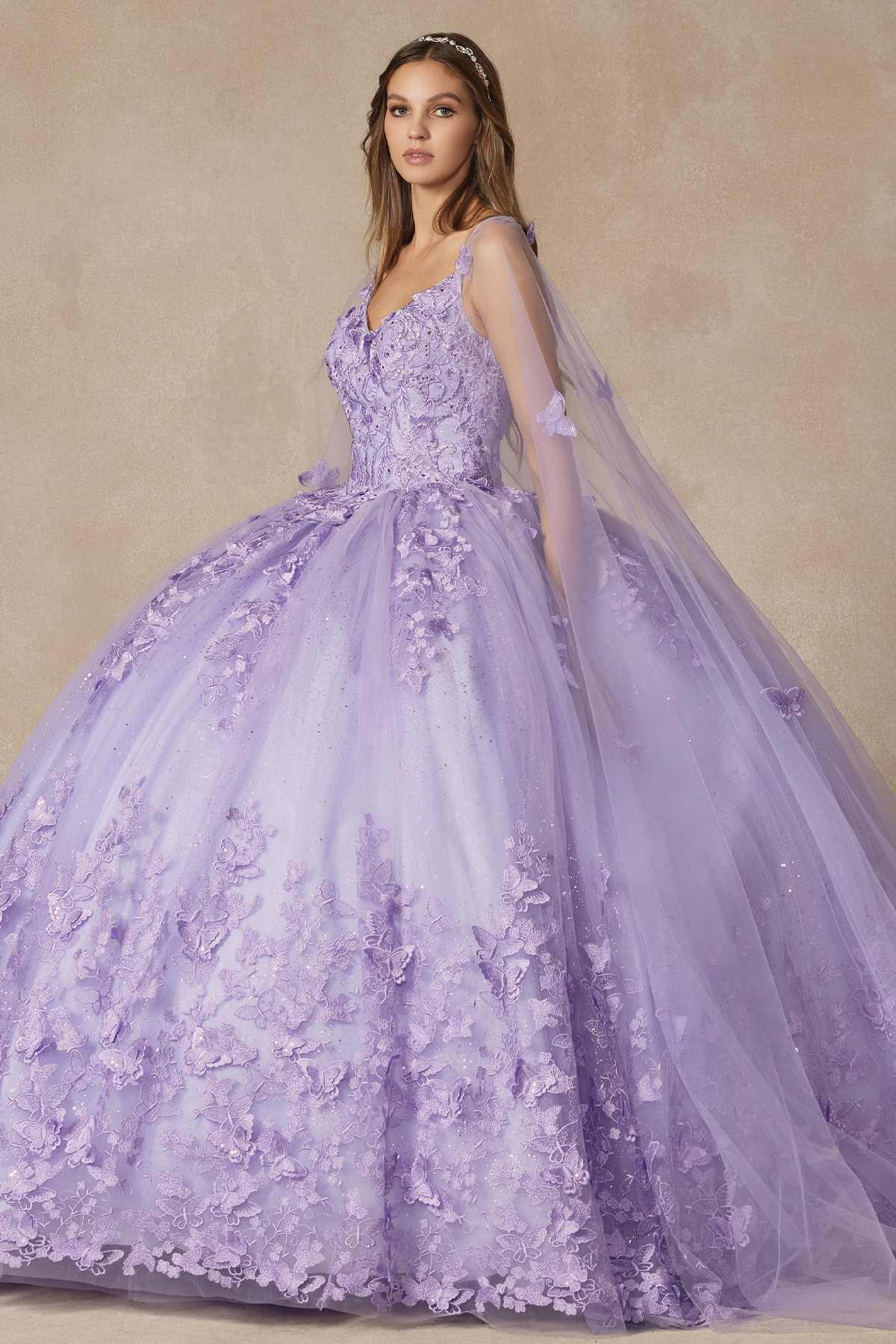 Lilac long quinceanera dress with lace corset bodice, butterfly appliques and voluminous skirt