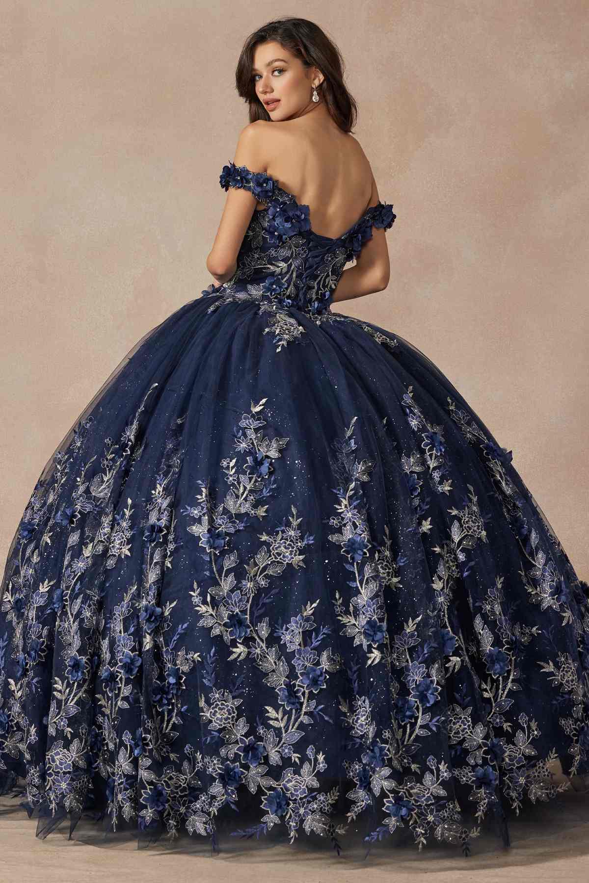 Blue off-shoulder ball gown with floral appliques across the skirt and ruffled neckline