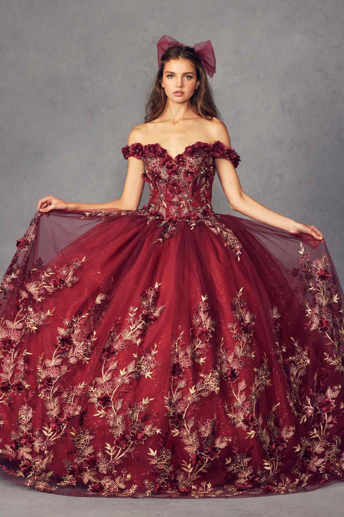 Burgundy off-shoulder ball gown with 3D floral appliques and wide flared skirt, bow