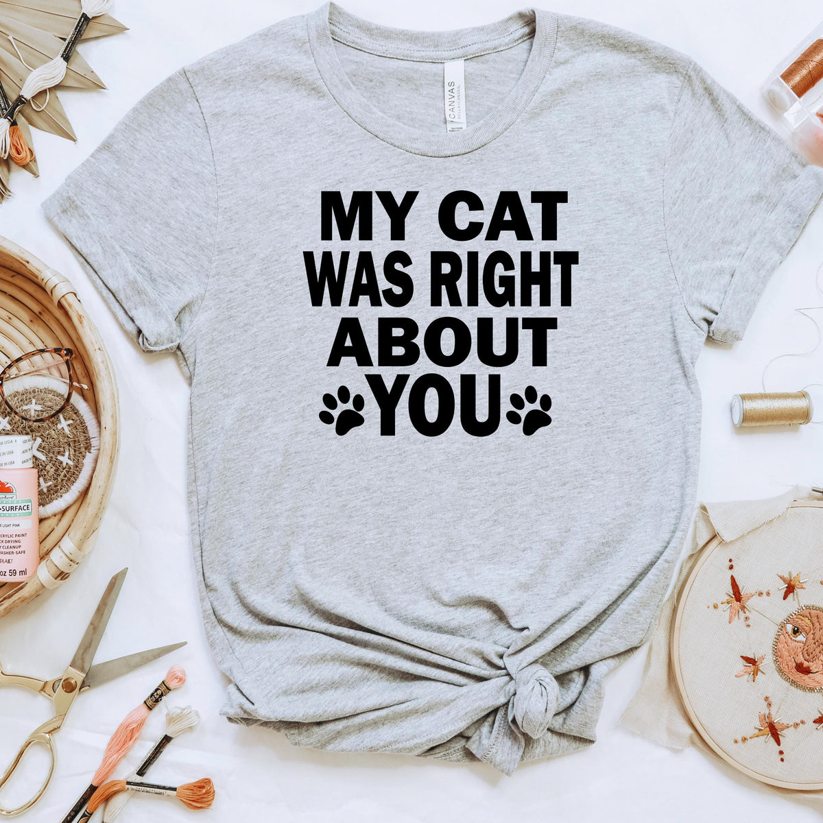 Heather gray graphic cat slogan t-shirt with 'MY CAT WAS RIGHT ABOUT YOU' paw print