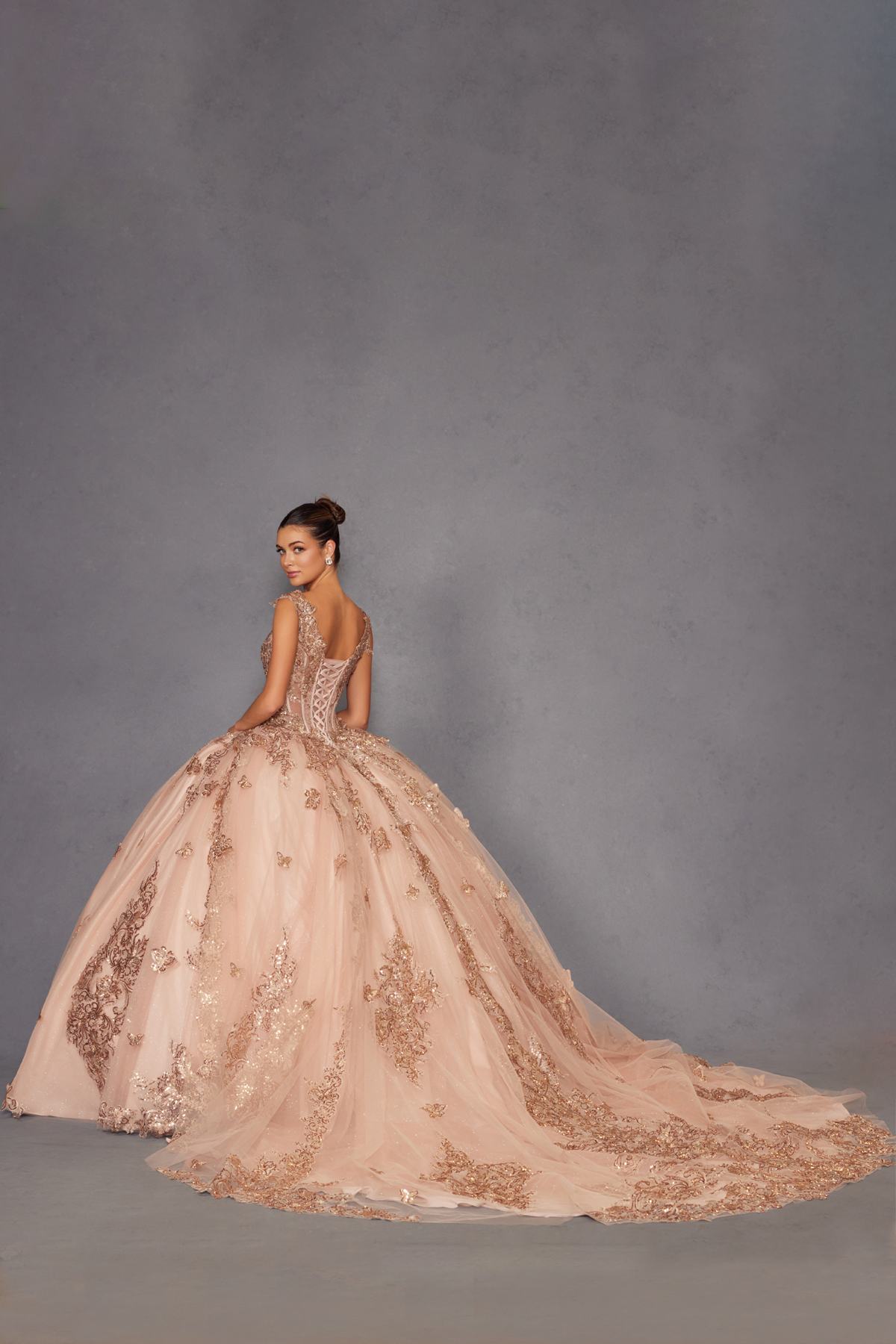Rose gold off-shoulder lace ball gown with floral embroidery and voluminous tulle skirt