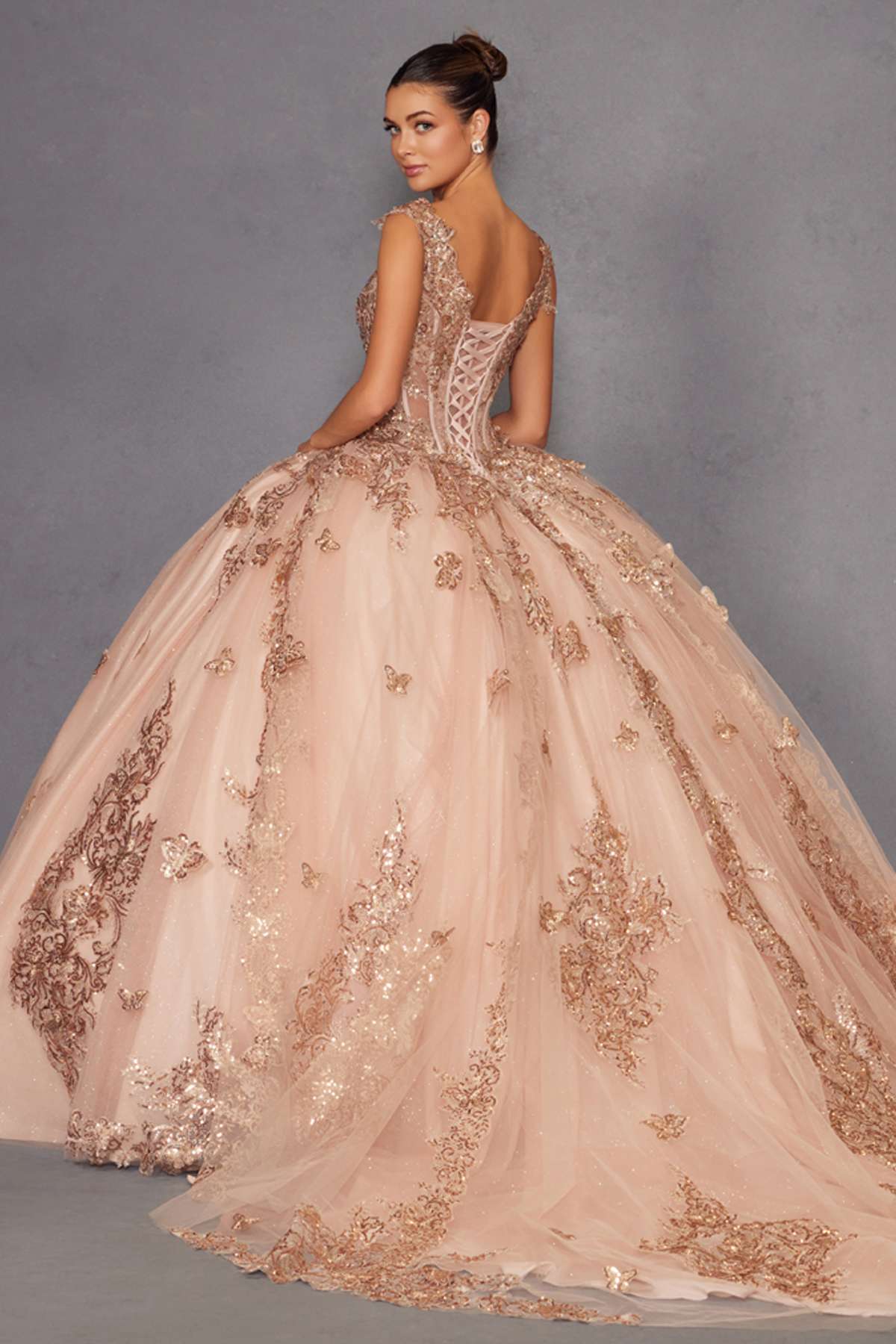 Rose gold off-shoulder ball gown with lace corset bodice and layered embroidered tulle skirt