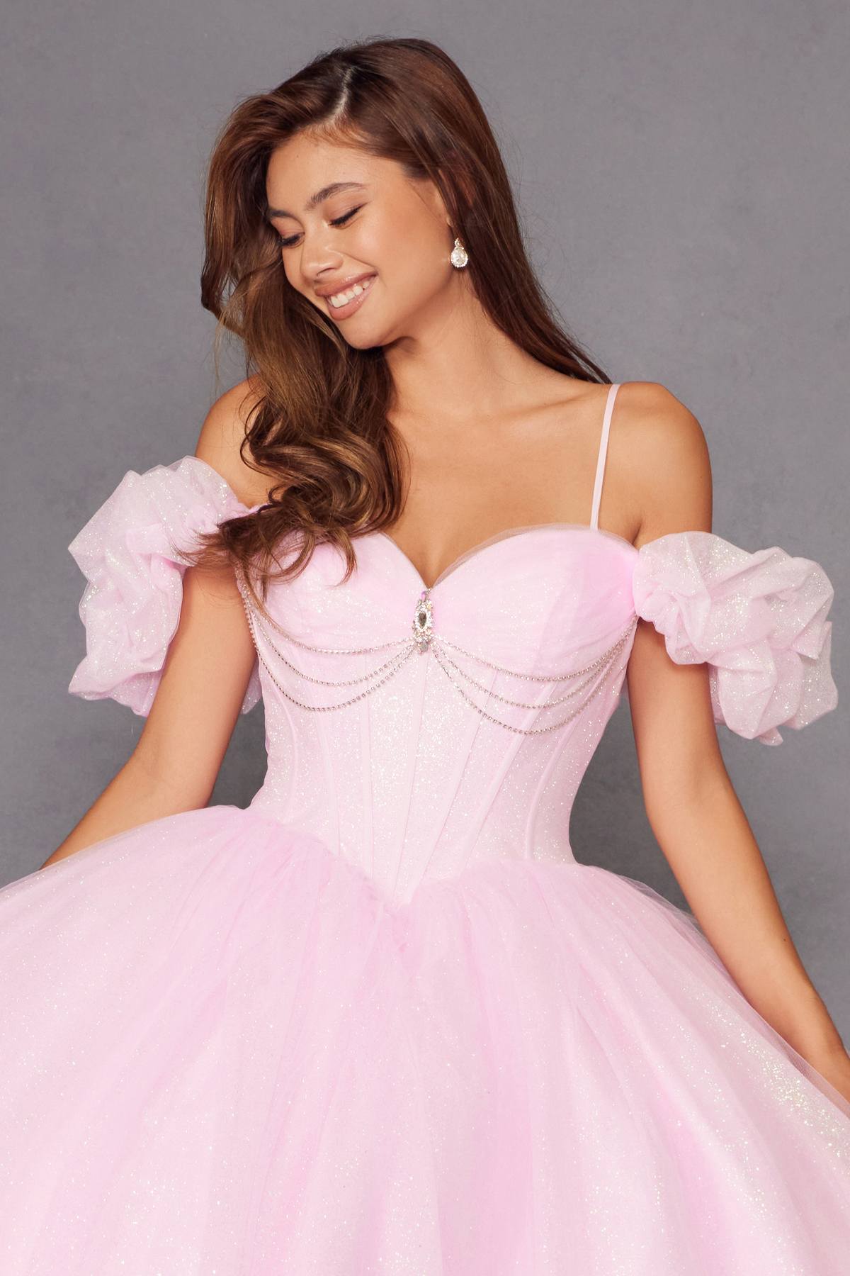 Baby pink off-shoulder corset ball gown with draped bust and puff sleeves