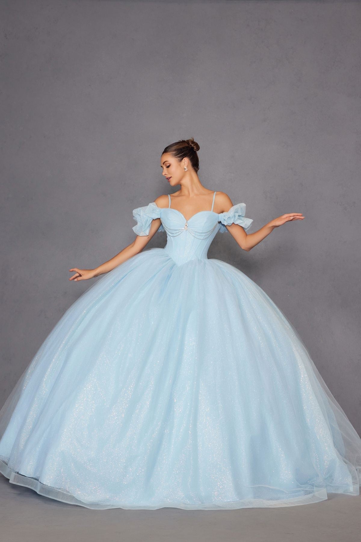 Bahama blue cold-shoulder ball gown with ruffled off-shoulder sleeves and full tulle skirt