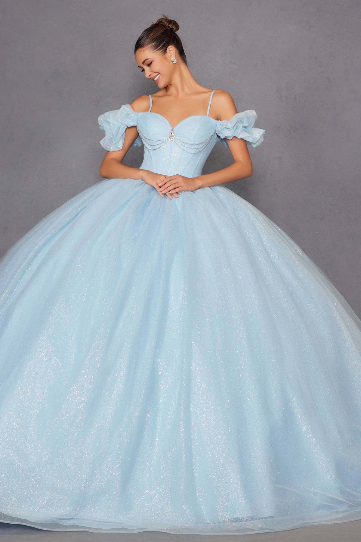 Light blue cold-shoulder ball gown with full glitter tulle skirt and lace-up bodice detail
