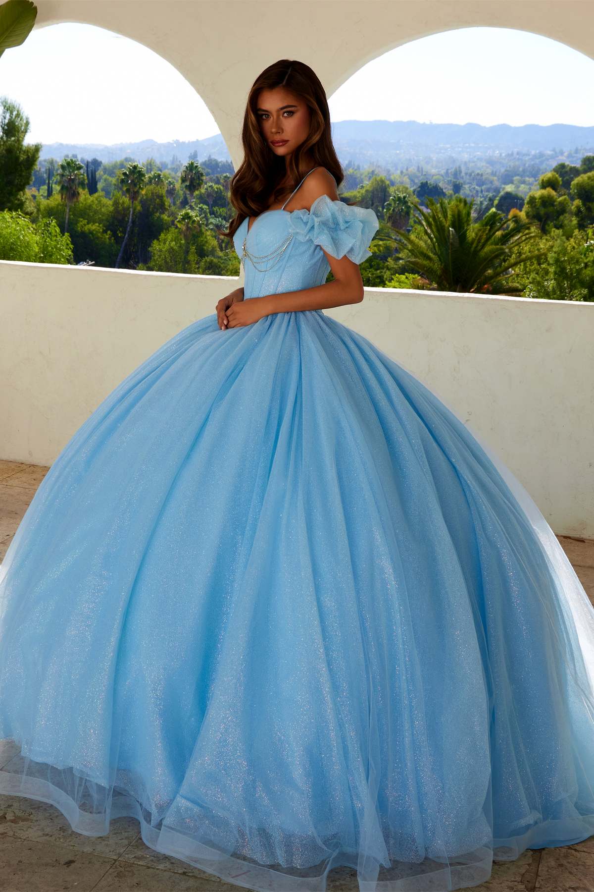 Bahama blue cold-shoulder ball gown with ruffled off-shoulder sleeves and full tulle skirt