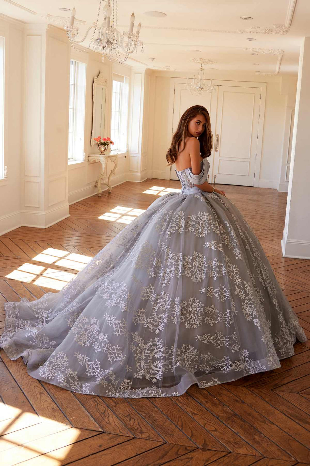 Silver A-line ball gown with off-shoulder sleeves and embroidered floral sparkle throughout