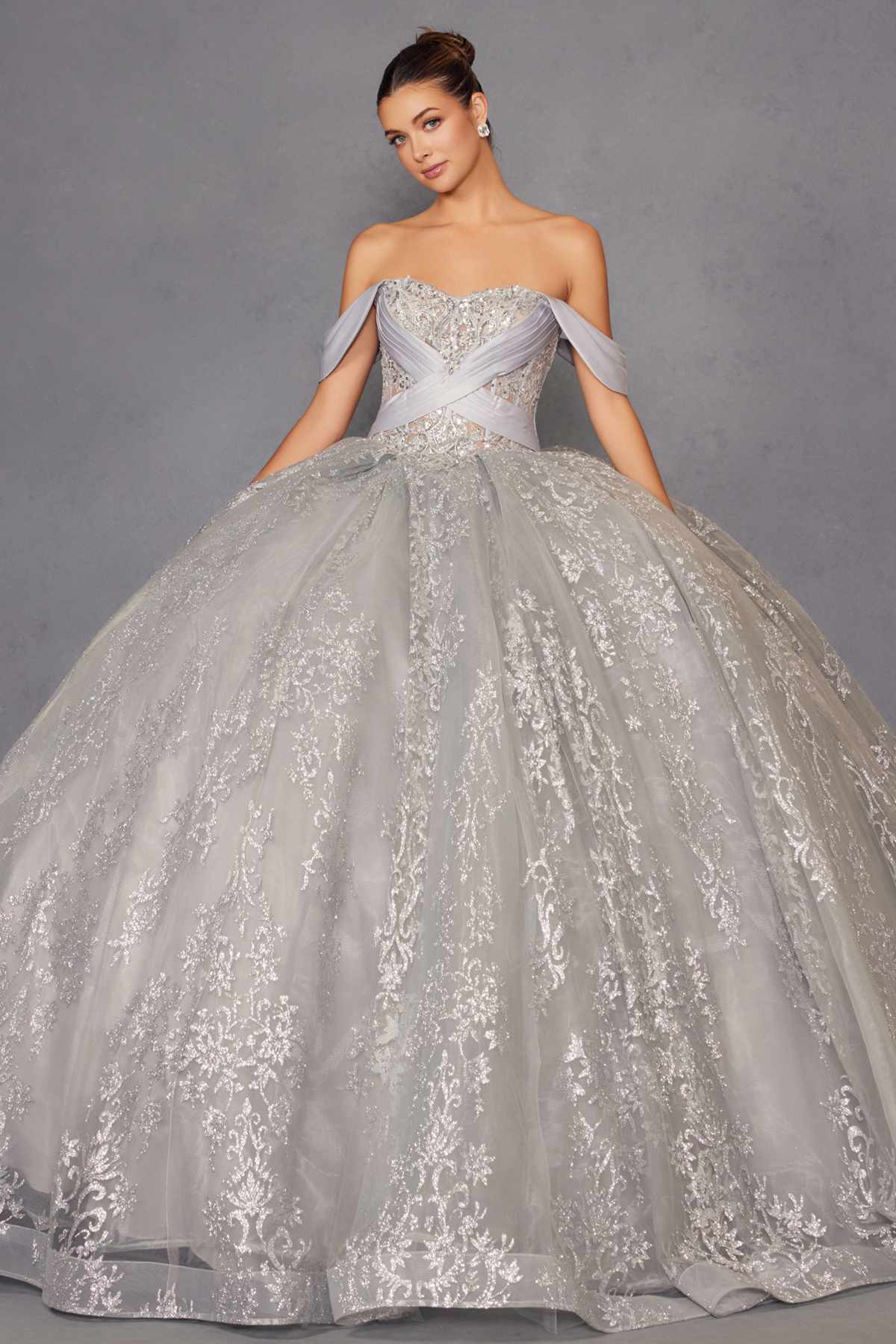 Silver embroidered A-line ball gown with sweetheart neckline and full flared skirt.