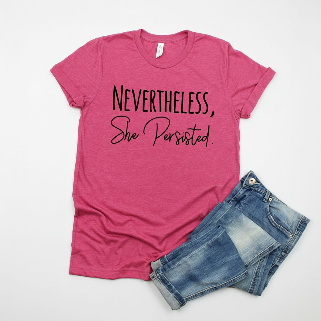 Raspberry pink unisex graphic tee with centered 'Nevertheless, She Persisted' text