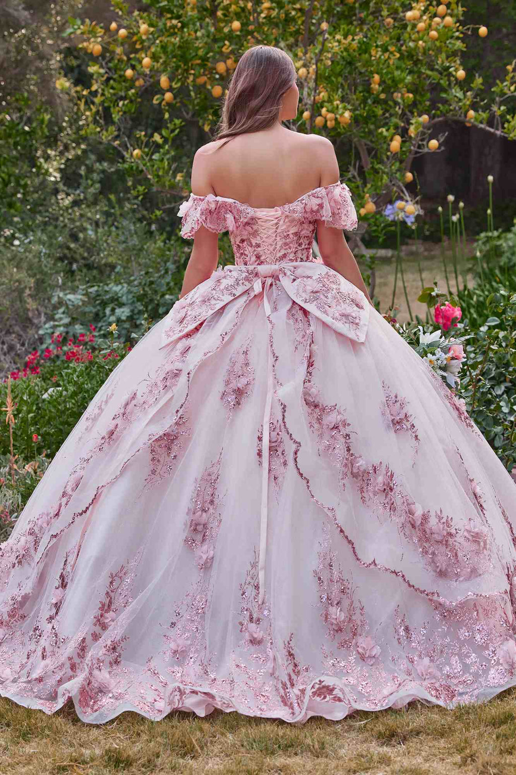 Pink off-the-shoulder A-line ball gown with lace-like floral embroidery and full twirly skirt