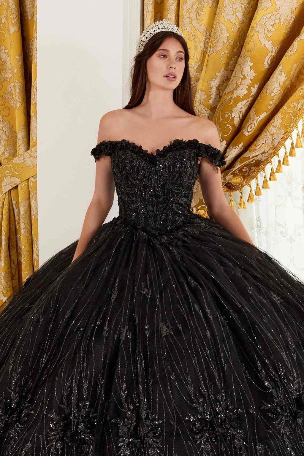 Black off-shoulder ball gown with beaded corset bodice and full voluminous skirt