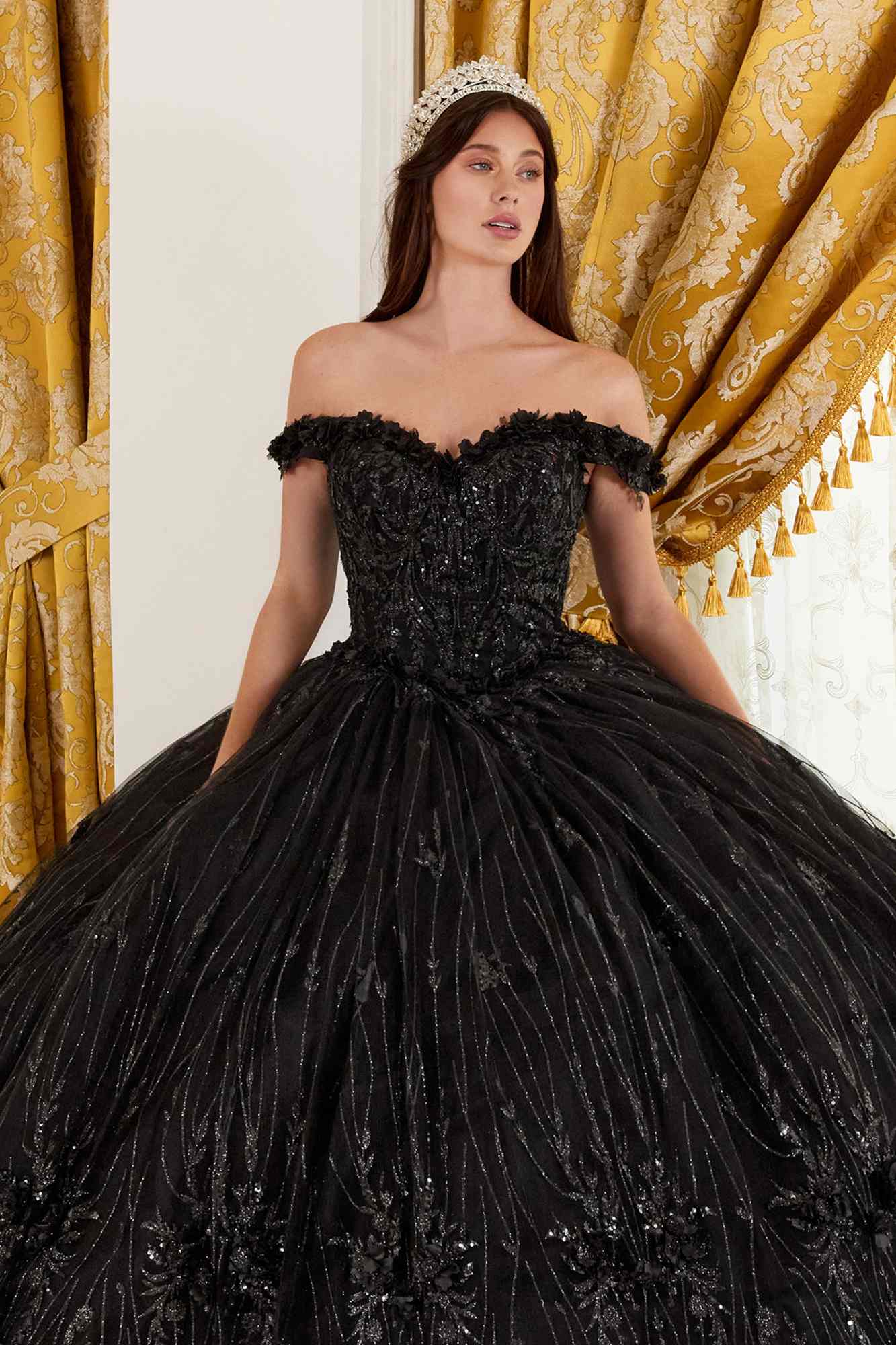 Black off-shoulder ball gown with beaded corset bodice and full voluminous skirt