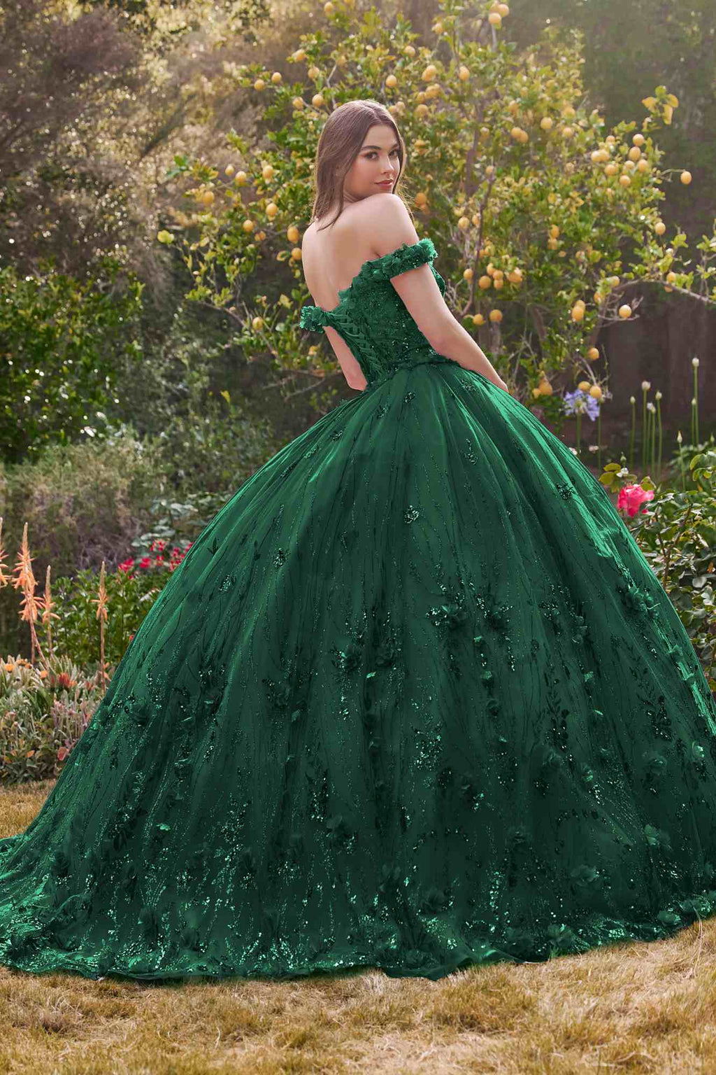 Emerald green off-shoulder ball gown with fitted bodice and full skirt for formal wear