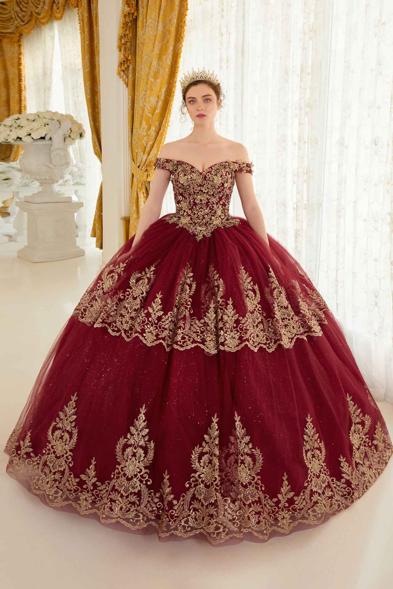 Burgundy off-shoulder princess A-line quinceanera gown with gold embroidered bodice