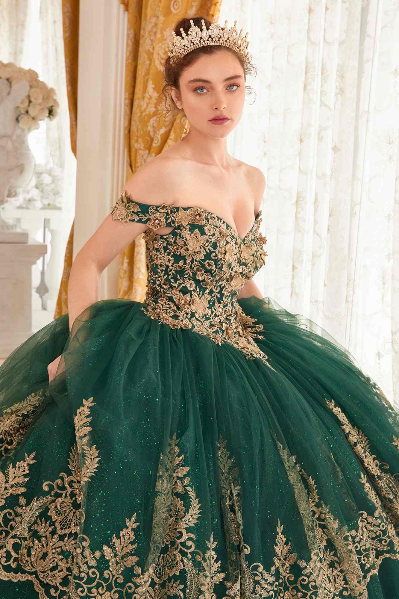 Emerald green off-shoulder quinceanera ball gown with gold embroidered bodice detail