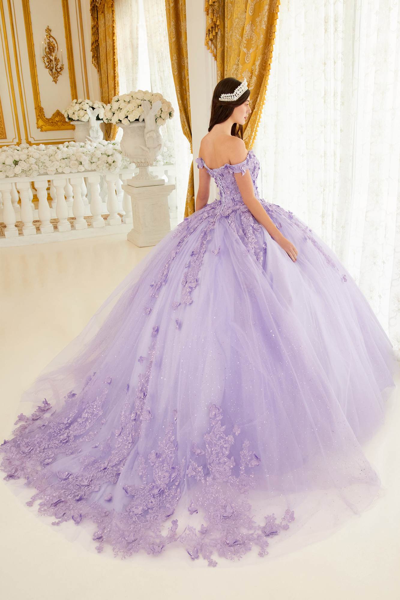 Lavender tulle ball gown with lace applique back, layered full skirt and off-shoulder sleeves