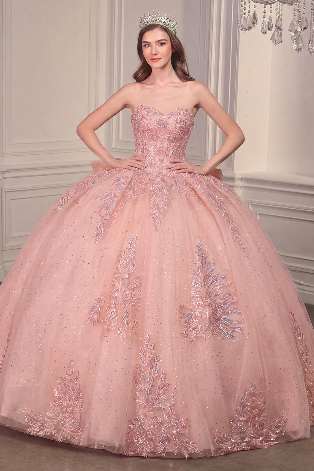 Blush pink strapless ballgown with full tulle skirt and silver-toned floral embroidery