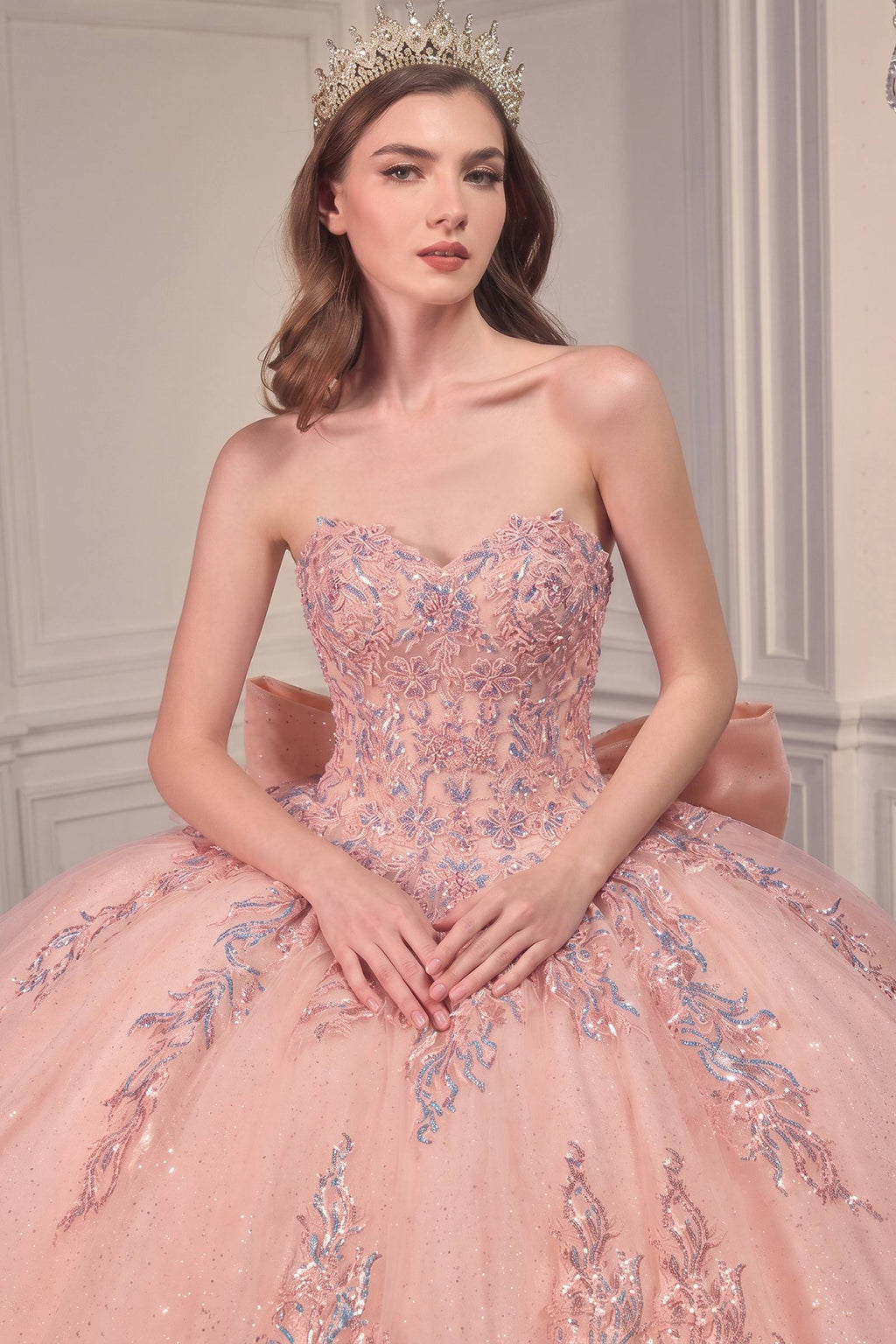 Blush pink strapless ballgown with sweetheart bodice and silver floral embroidery