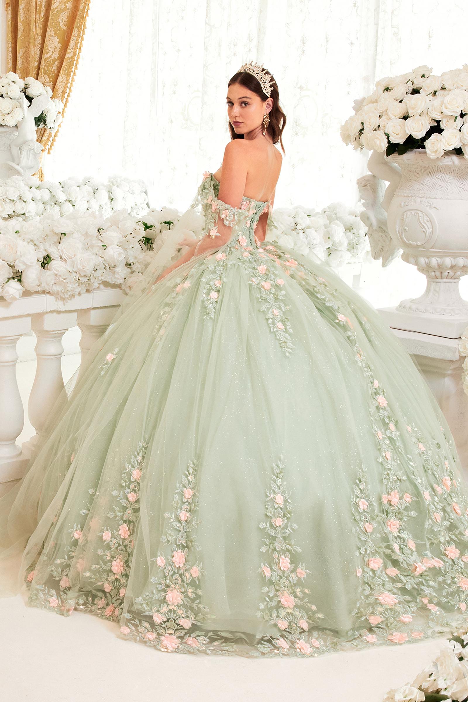 Sage green off-shoulder ballgown with cap sleeves, layered skirt, and floral embroidery