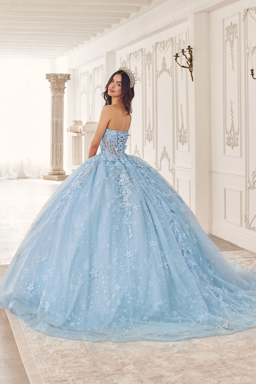 Long poofy quinceañera gown in light blue with sweetheart neckline and full embroidered skirt