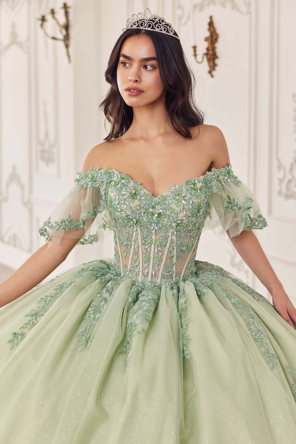 Sage green off-shoulder gown with lace sleeves, sweetheart neckline, layered tulle skirt