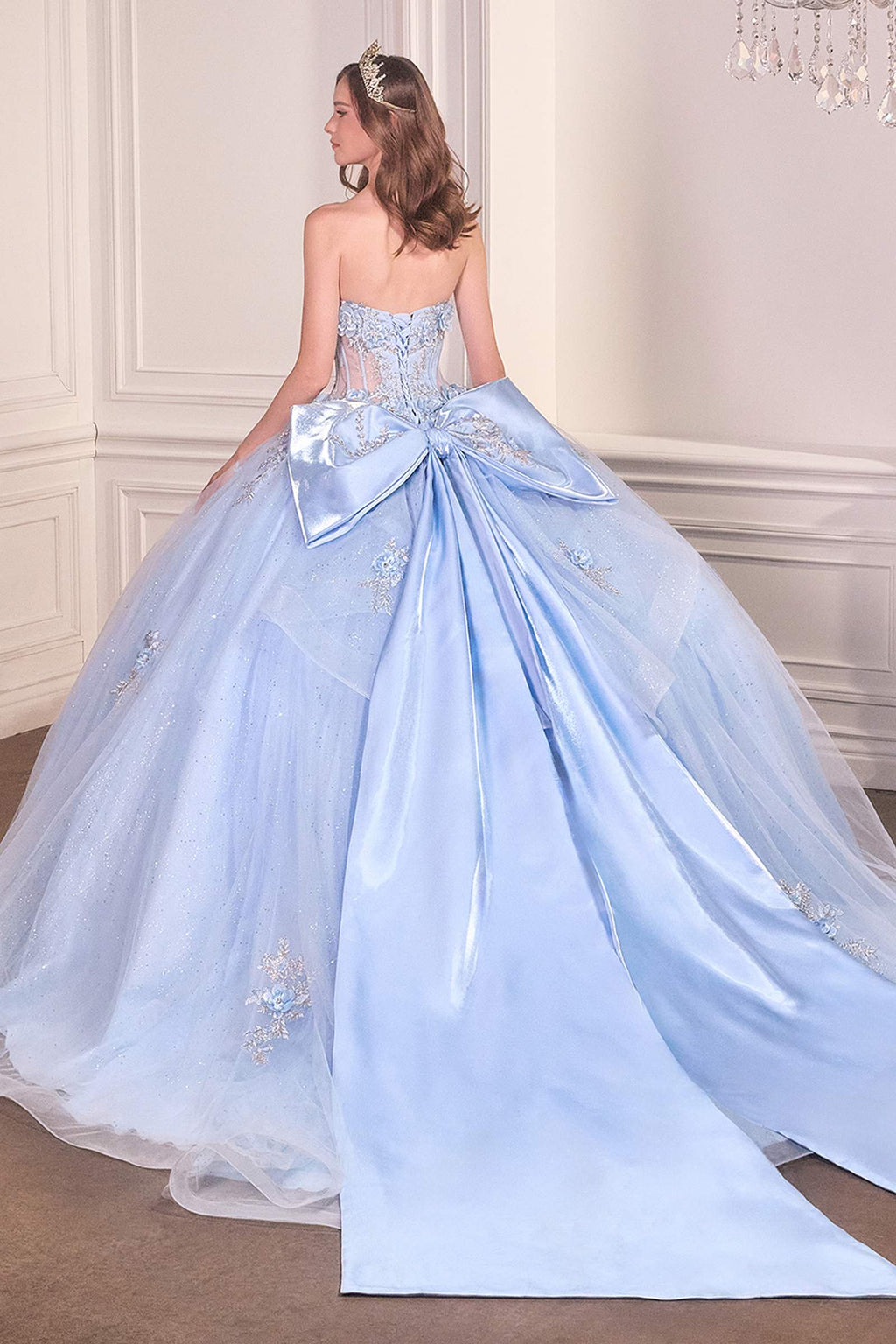 Light blue strapless sweetheart ball gown with beaded bodice and voluminous tulle skirt