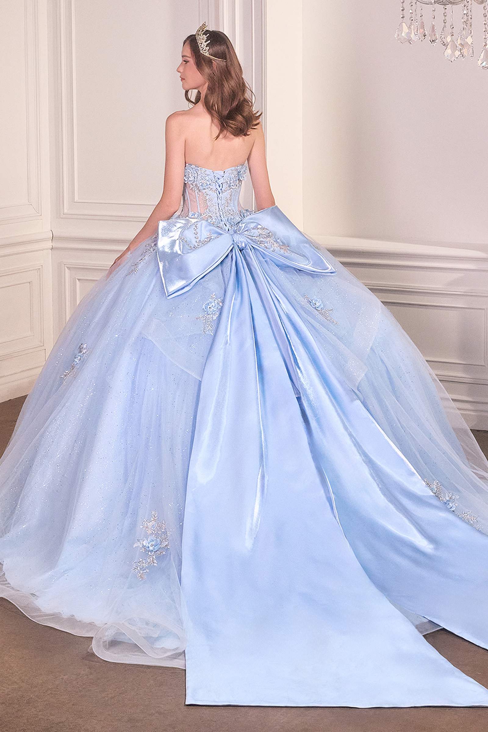 Light blue strapless sweetheart ball gown with beaded bodice and voluminous tulle skirt
