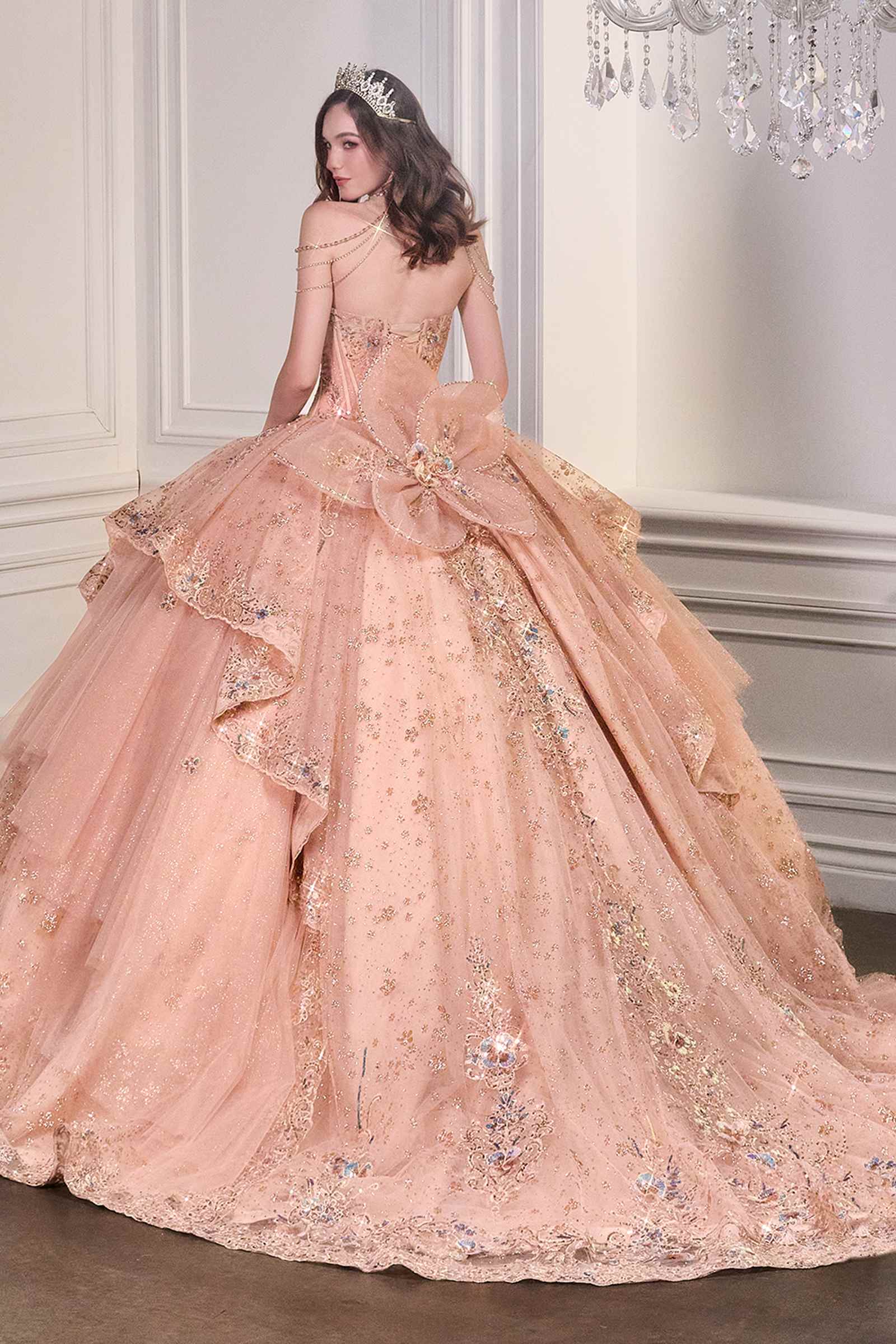 Rose gold ball gown with layered tulle skirt and sparkling beaded applique