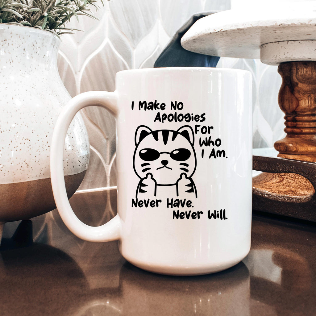 White ceramic coffee mug with black cat graphic and quote “Never Have. Never Will.”