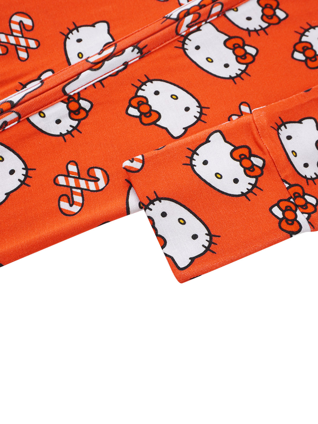 Red Hello Kitty romper leg opening with ribbed cuff and allover cat print