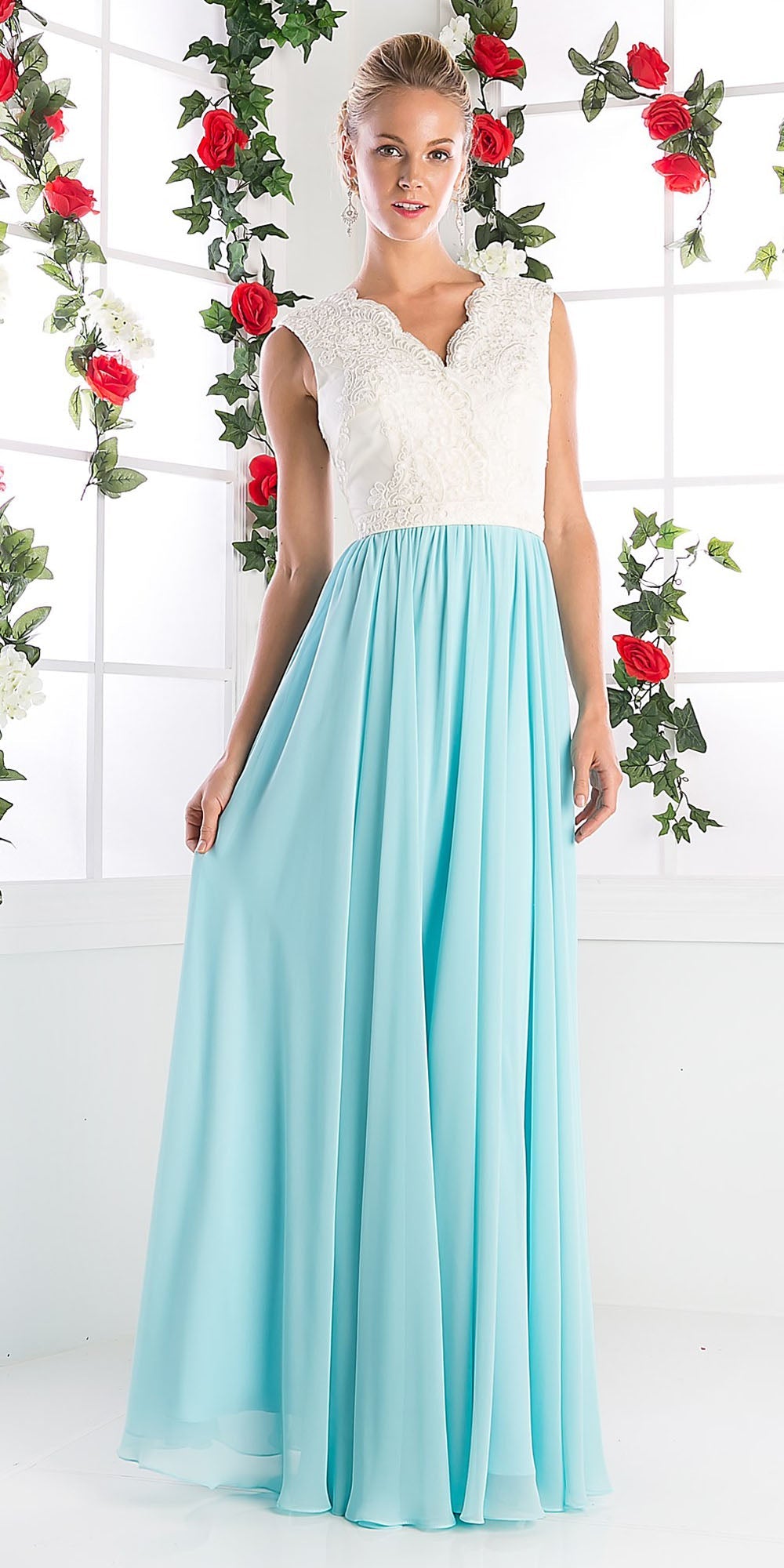 Sleeveless V-neck dress with embroidered bodice and light blue pleated skirt