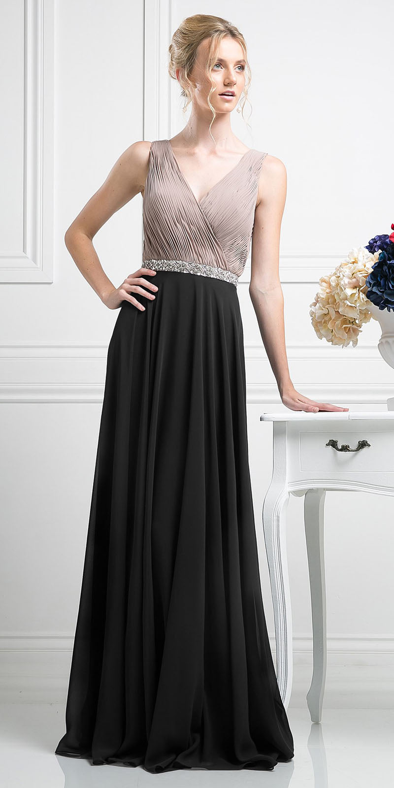 A-line pleated chiffon dress with V-neck, sleeveless fitted bodice, dark skirt