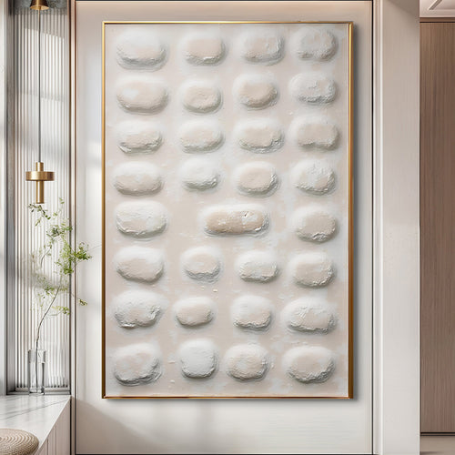 Abstract minimalist canvas wall art with raised white oval texture, gold-toned frame