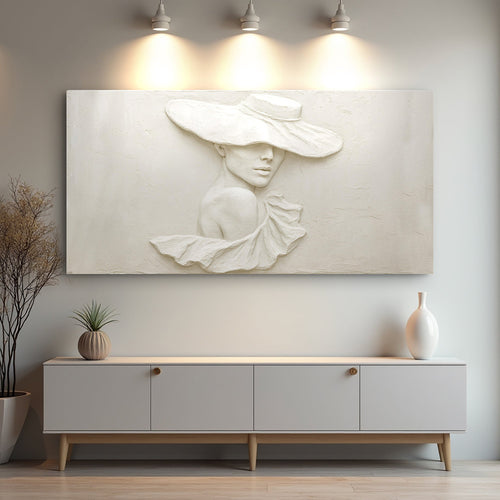 White 3D relief female portrait wall art with hat and draped scarf, textured canvas panel
