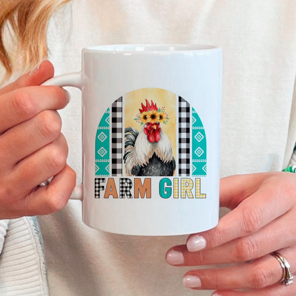 White ceramic mug held by hands, featuring rooster and sunflower crown Farm Girl print