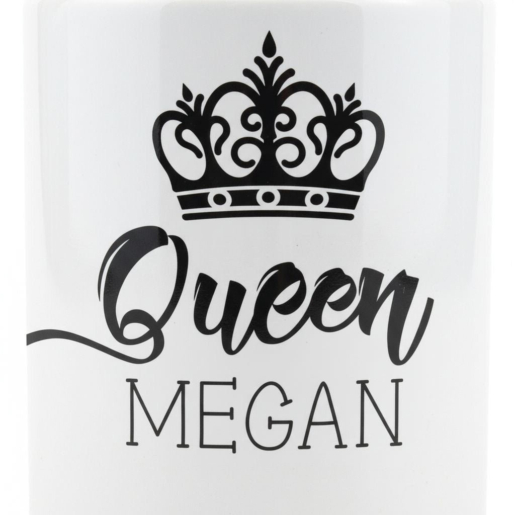 Close-up of white mug showing black crown icon and large “Queen MEGAN” text.