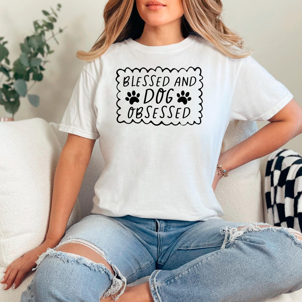 White short-sleeve T-shirt with “Blessed and Dog Obsessed” paw print chest graphic