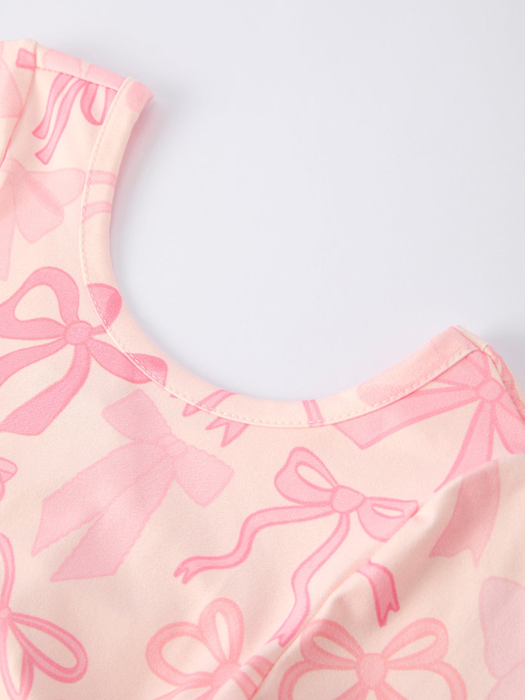 Girls Pink Bow Print Long Sleeve Jumpsuit