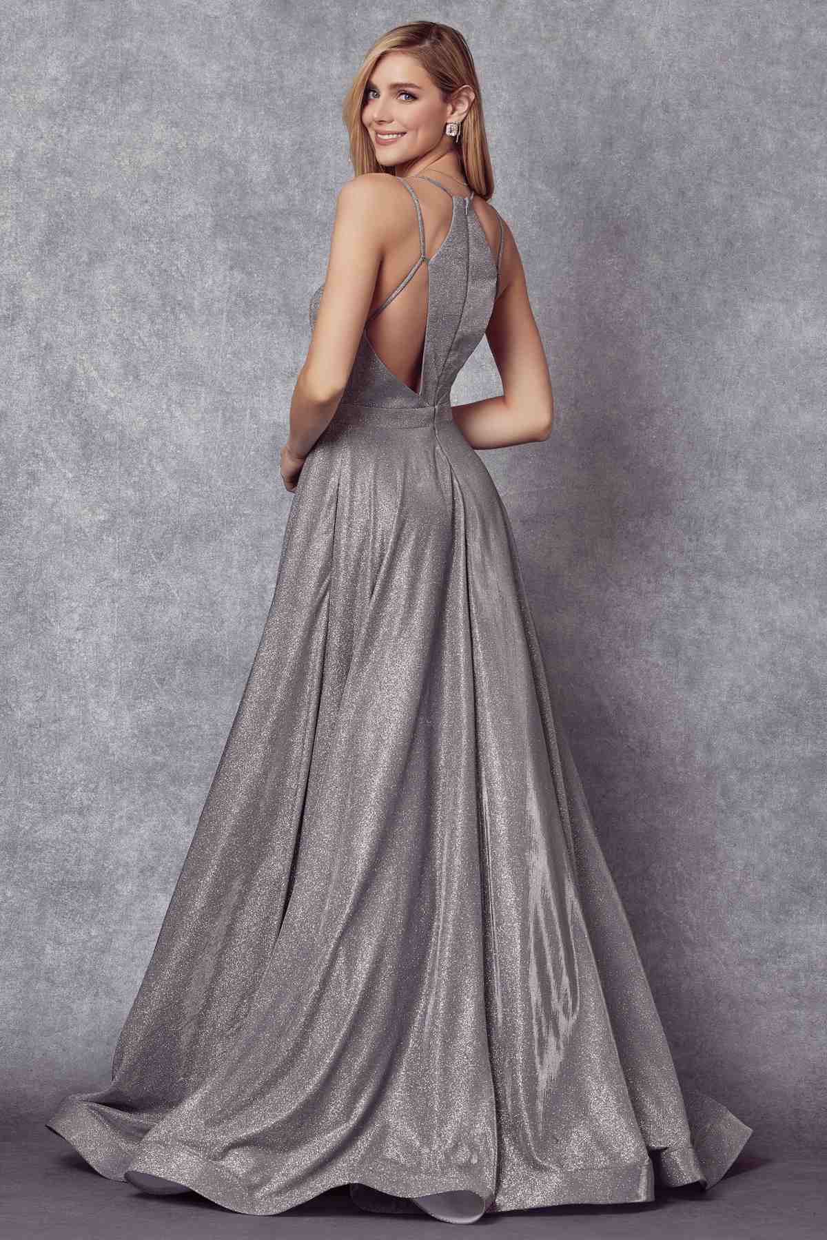 Silver glitter ball gown with thin straps and crisscross open back detail