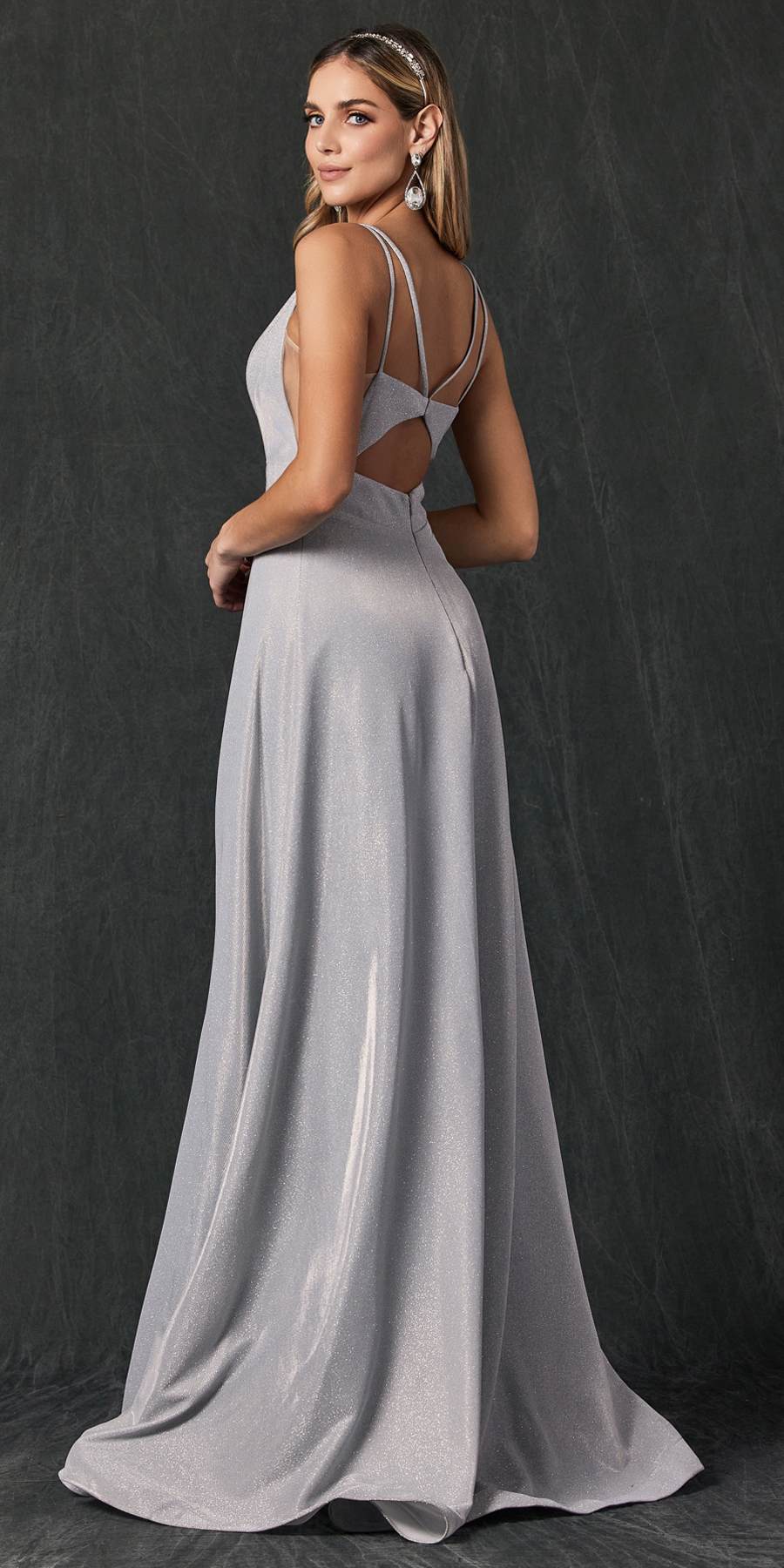 Silver glitter long dress back view with strappy cut-out detail and flowing skirt