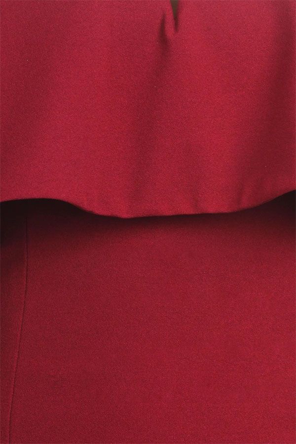 Dark red fabric close-up with textured weave